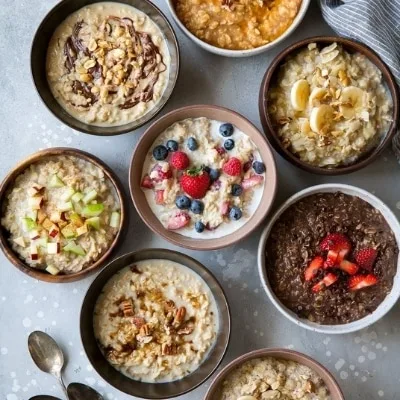 traditional oatmeal in bowls - with fruit